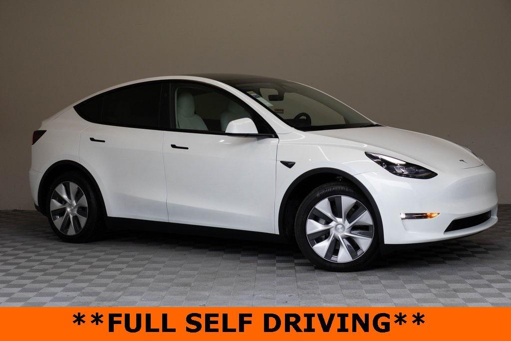 used 2024 Tesla Model Y car, priced at $35,995