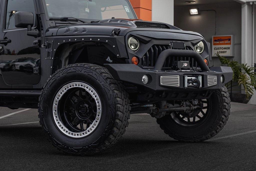 used 2012 Jeep Wrangler Unlimited car, priced at $18,995