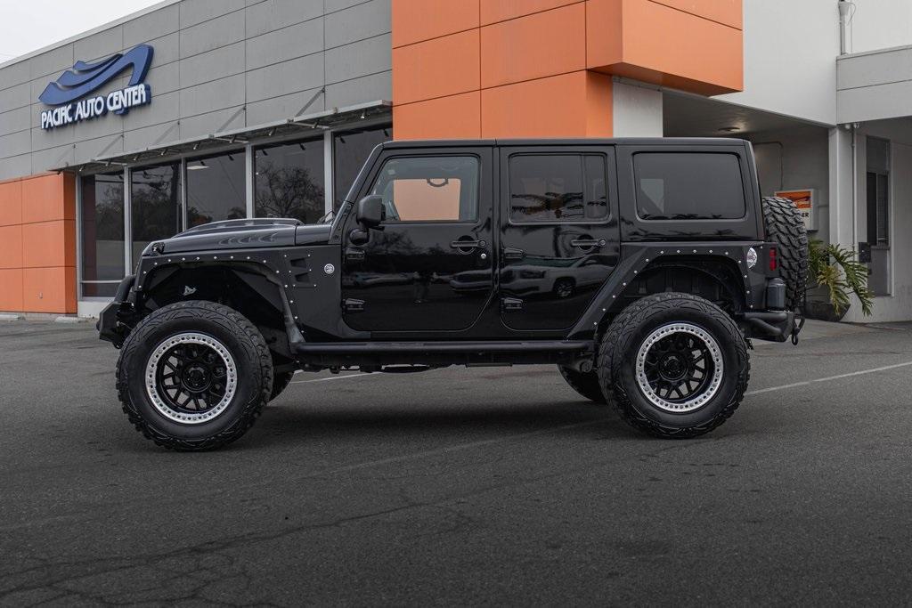 used 2012 Jeep Wrangler Unlimited car, priced at $18,995