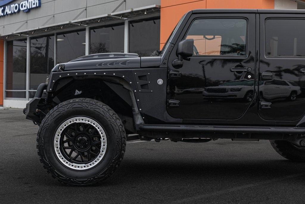 used 2012 Jeep Wrangler Unlimited car, priced at $18,995