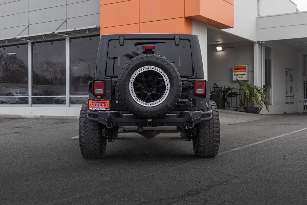 used 2012 Jeep Wrangler Unlimited car, priced at $18,995