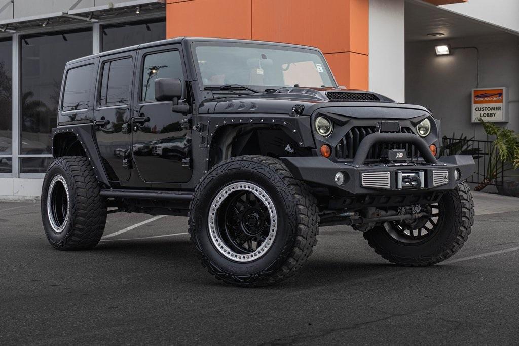 used 2012 Jeep Wrangler Unlimited car, priced at $18,995