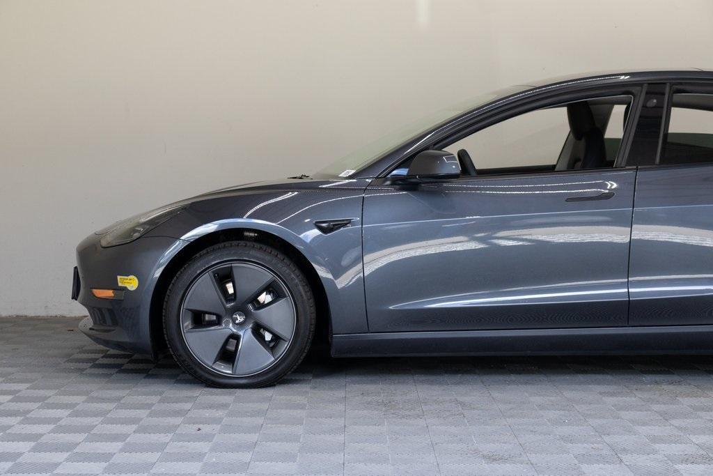 used 2023 Tesla Model 3 car, priced at $20,895