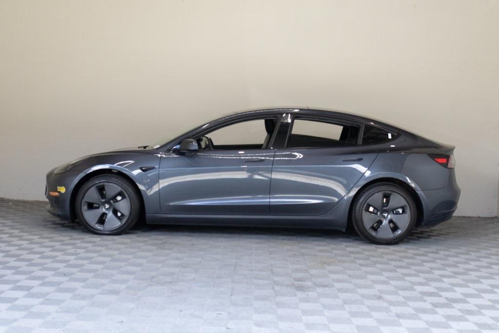 used 2023 Tesla Model 3 car, priced at $20,895
