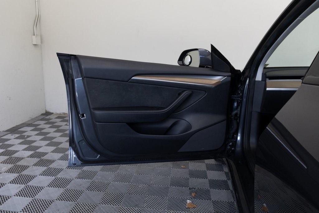 used 2023 Tesla Model 3 car, priced at $20,895