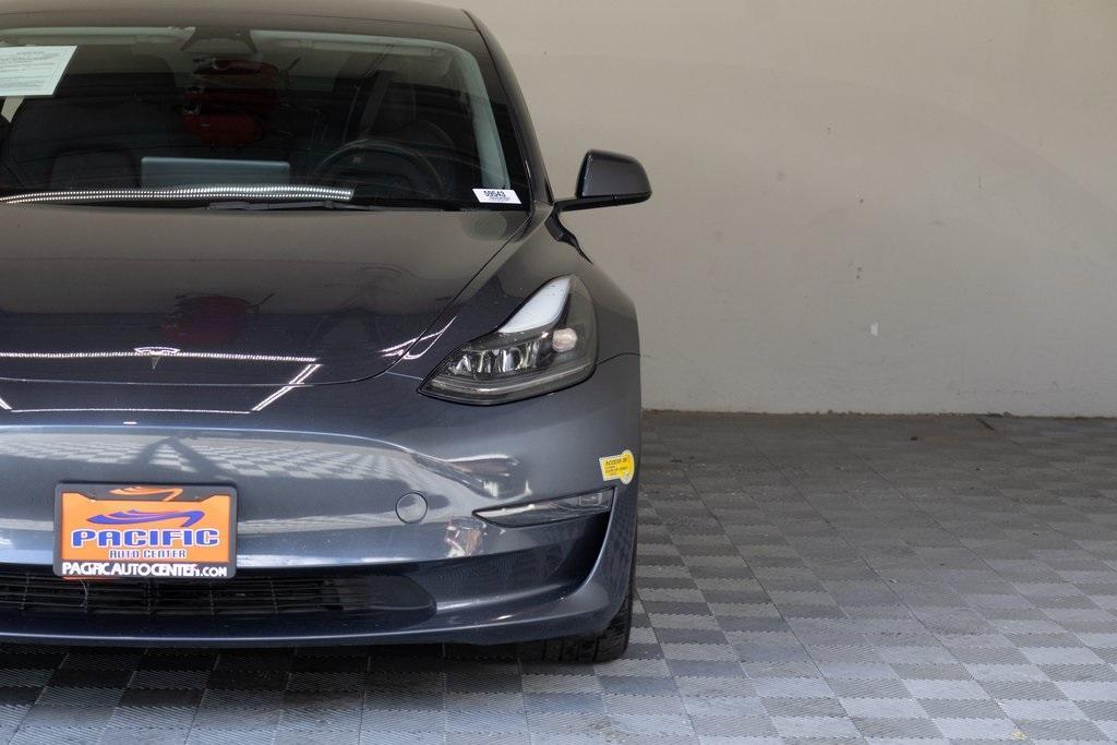 used 2023 Tesla Model 3 car, priced at $20,895