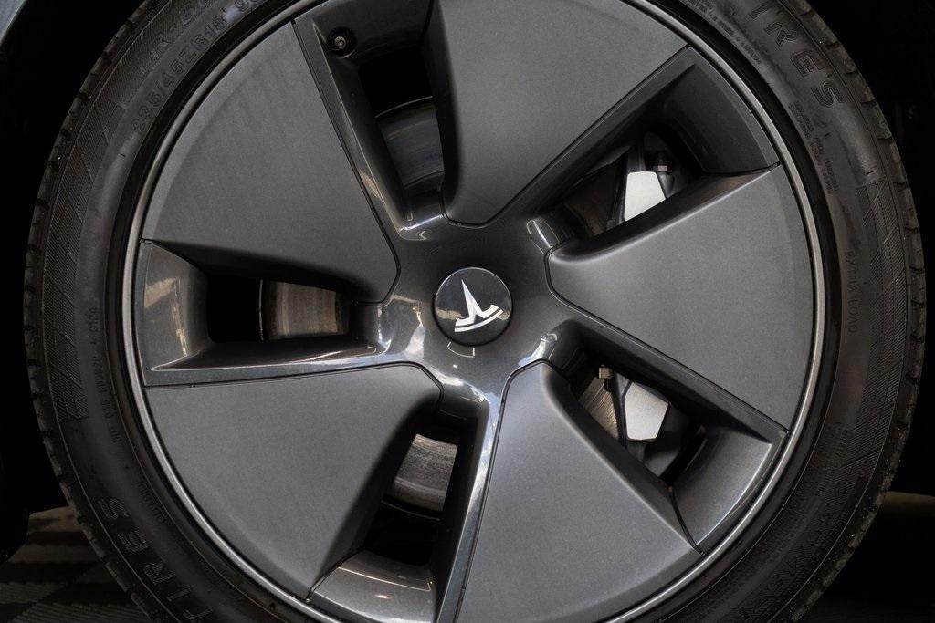 used 2023 Tesla Model 3 car, priced at $20,895