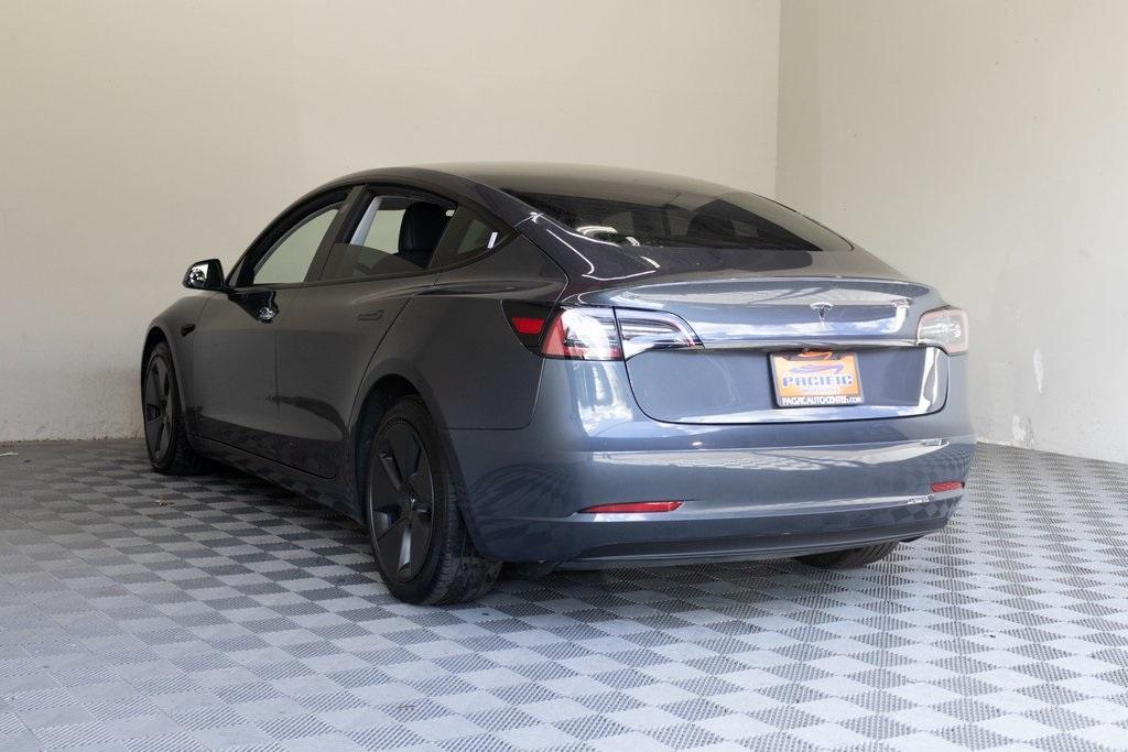 used 2023 Tesla Model 3 car, priced at $20,895