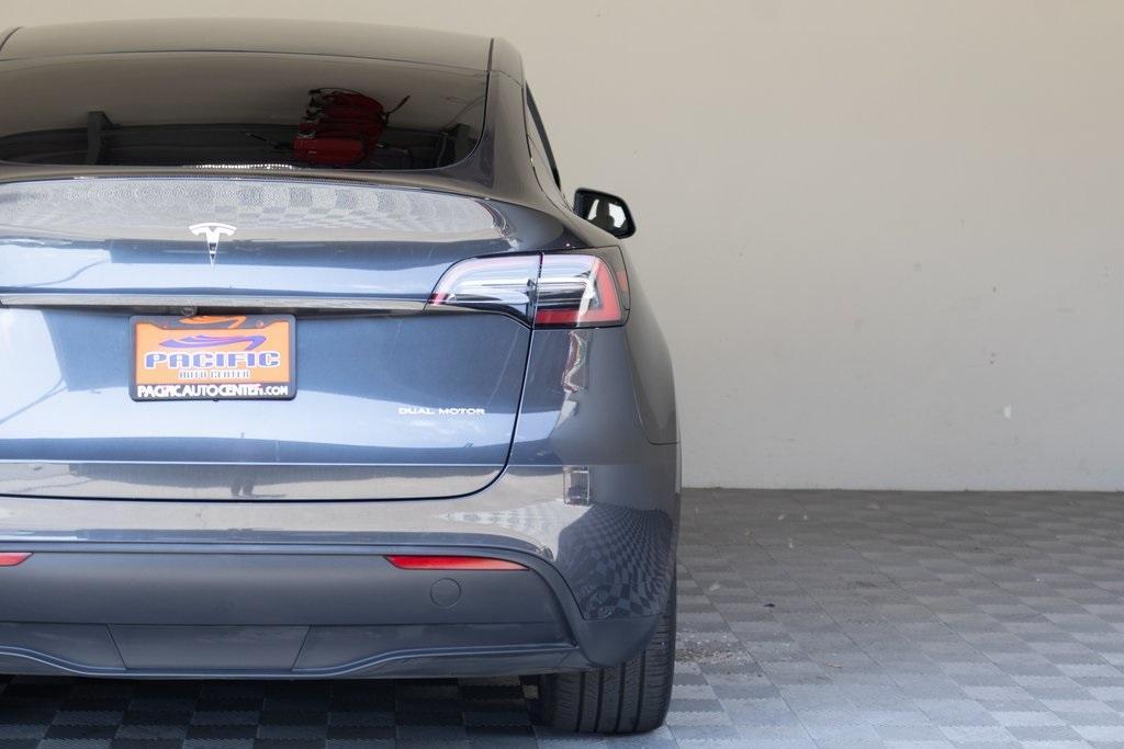 used 2024 Tesla Model Y car, priced at $29,989