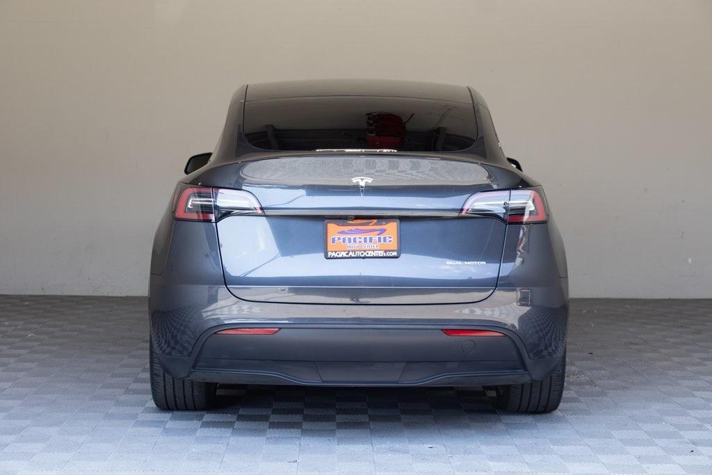 used 2024 Tesla Model Y car, priced at $29,989