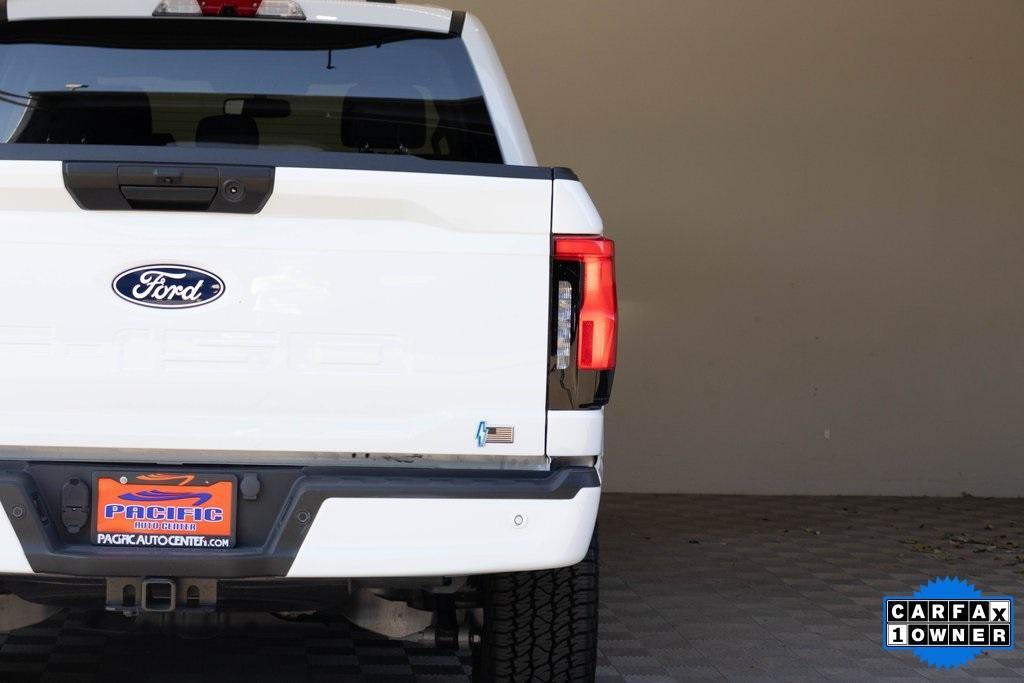 used 2024 Ford F-150 Lightning car, priced at $47,995