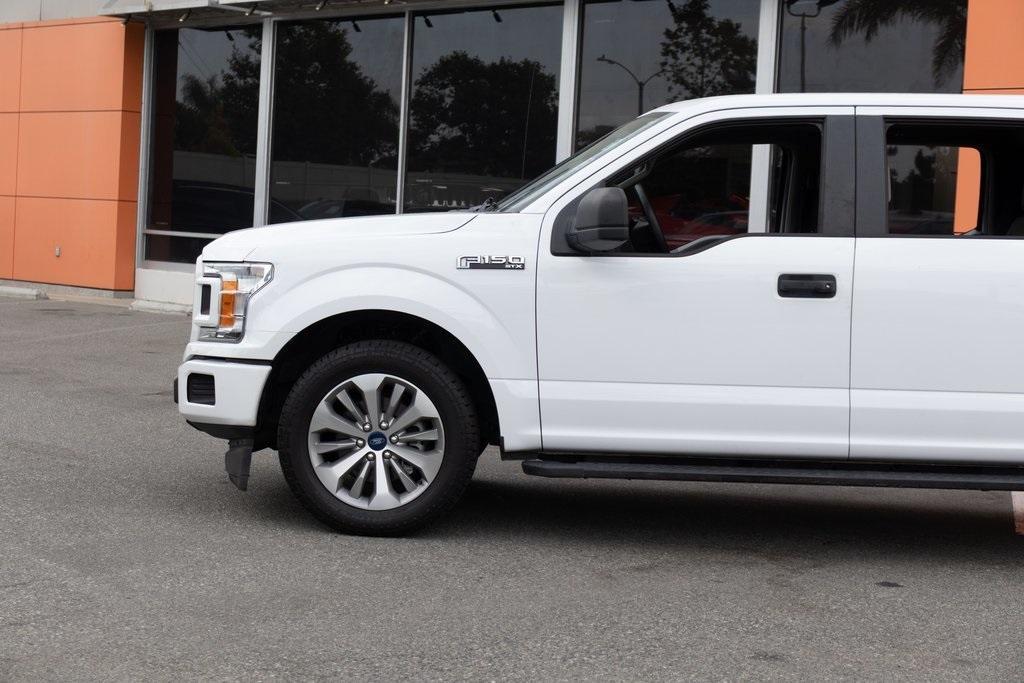 used 2018 Ford F-150 car, priced at $17,995