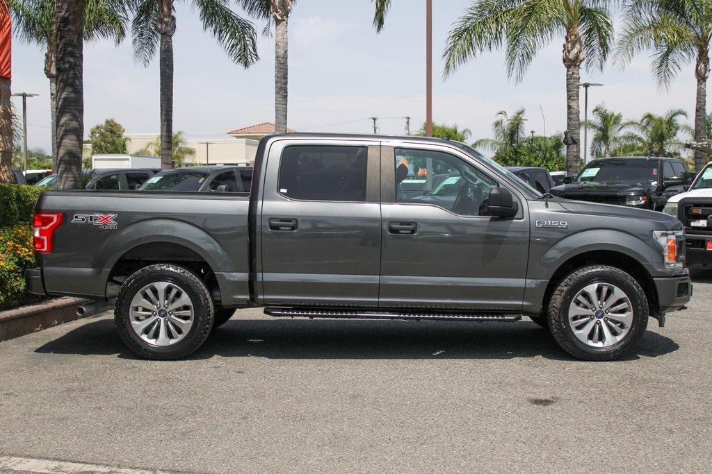 used 2018 Ford F-150 car, priced at $22,995