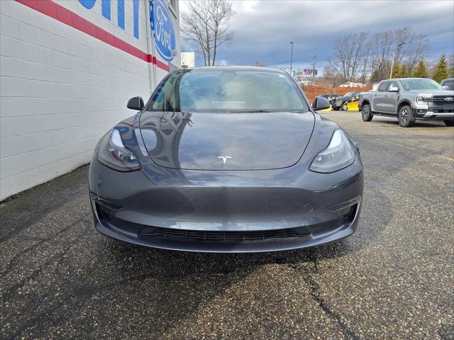 used 2022 Tesla Model 3 car, priced at $25,999