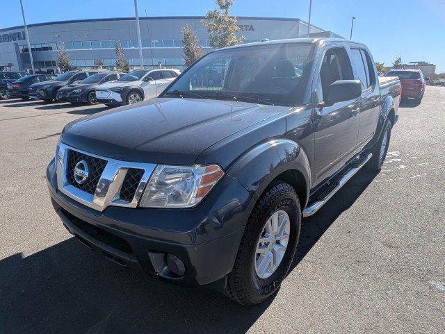 used 2015 Nissan Frontier car, priced at $16,495