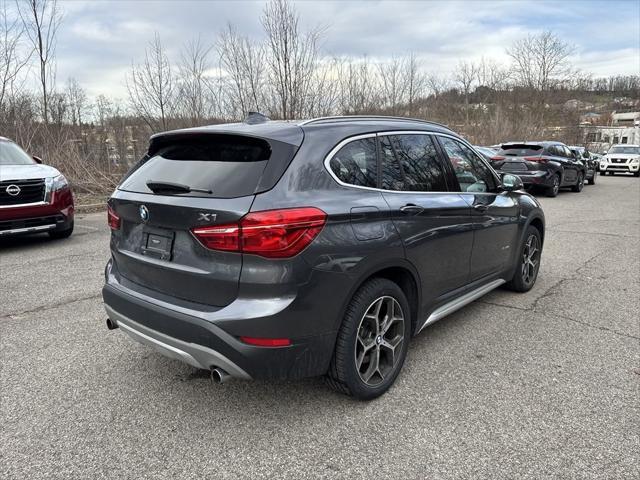 used 2018 BMW X1 car, priced at $17,954