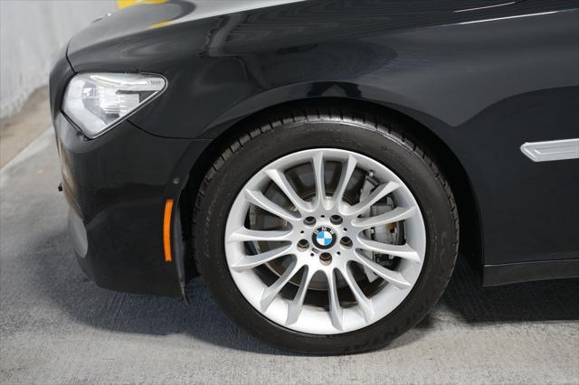 used 2014 BMW 750 car, priced at $17,980