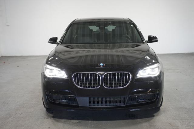 used 2014 BMW 750 car, priced at $17,980