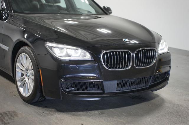 used 2014 BMW 750 car, priced at $17,980