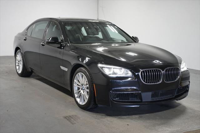 used 2014 BMW 750 car, priced at $17,980