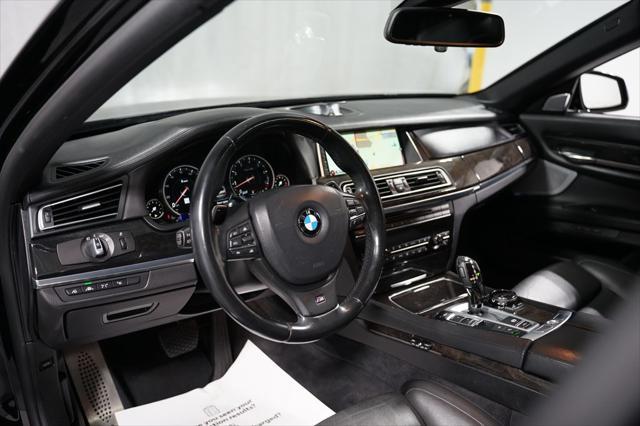 used 2014 BMW 750 car, priced at $17,980