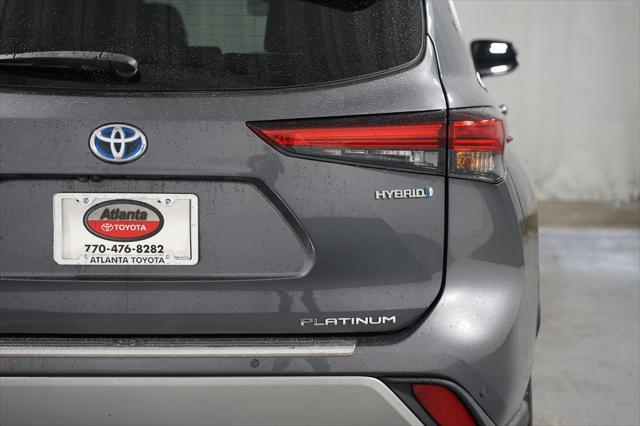 used 2021 Toyota Highlander Hybrid car, priced at $34,980
