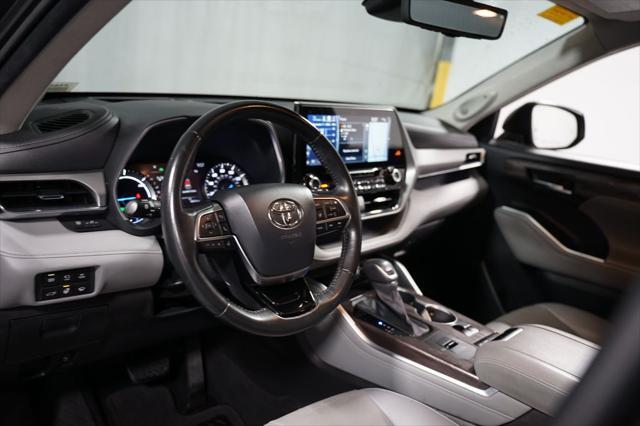 used 2021 Toyota Highlander Hybrid car, priced at $34,980