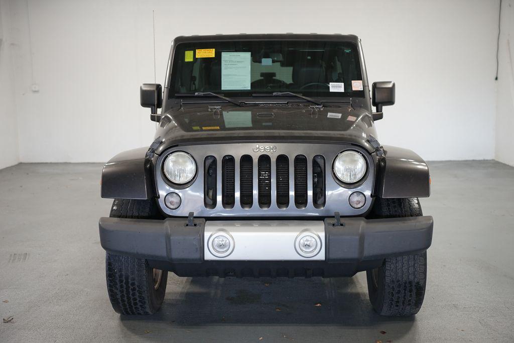 used 2014 Jeep Wrangler Unlimited car, priced at $15,980