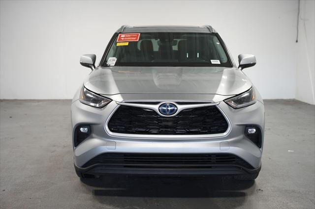 used 2021 Toyota Highlander Hybrid car, priced at $30,980