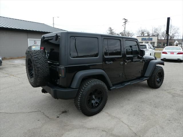 used 2015 Jeep Wrangler Unlimited car, priced at $19,995