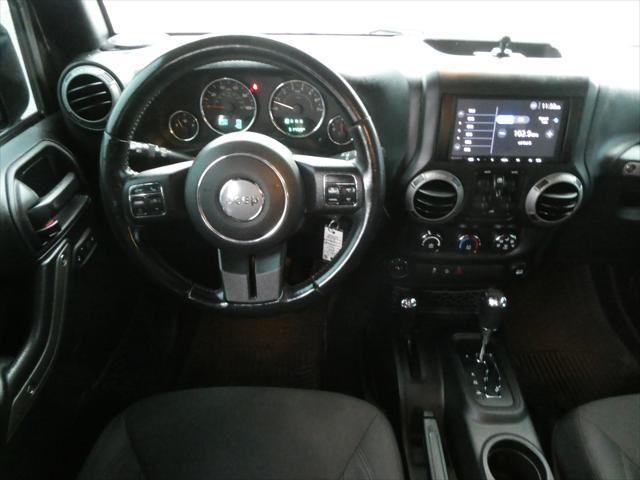 used 2015 Jeep Wrangler Unlimited car, priced at $19,995