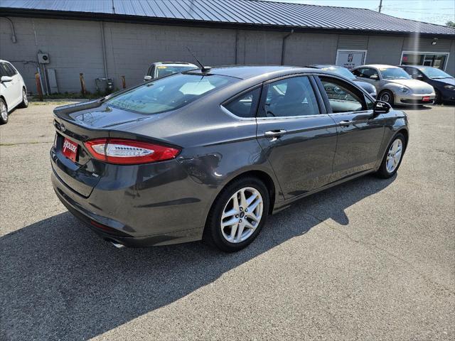 used 2016 Ford Fusion car, priced at $12,995