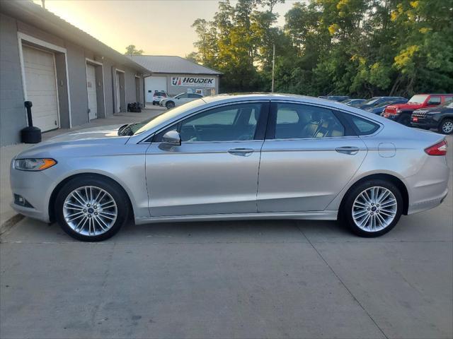 used 2016 Ford Fusion car, priced at $12,695
