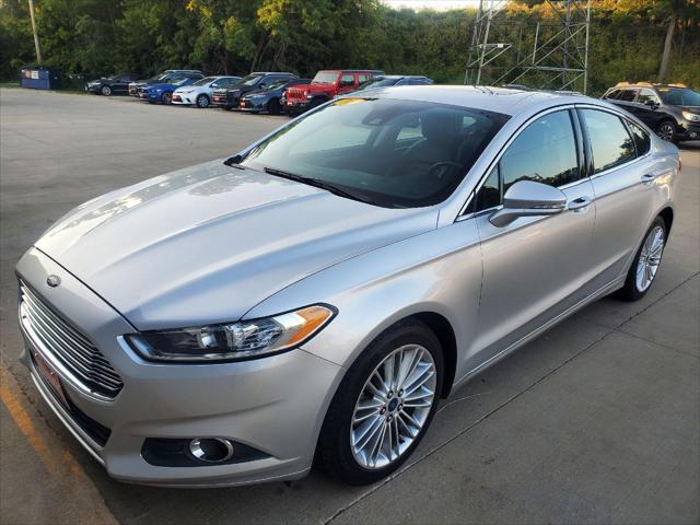 used 2016 Ford Fusion car, priced at $12,695