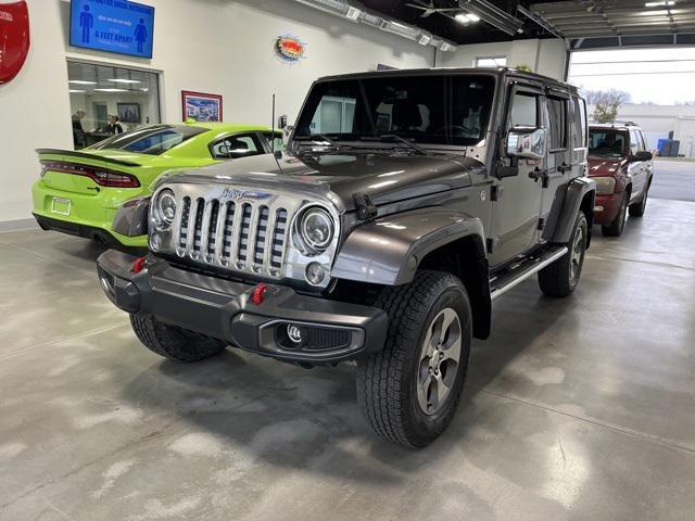 used 2014 Jeep Wrangler Unlimited car, priced at $16,808