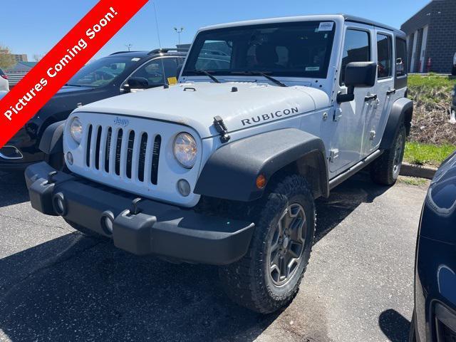 used 2014 Jeep Wrangler Unlimited car, priced at $13,824