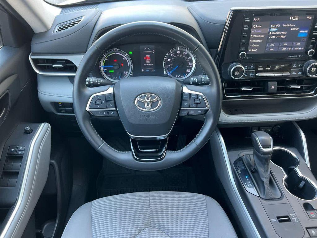used 2021 Toyota Highlander Hybrid car, priced at $29,990