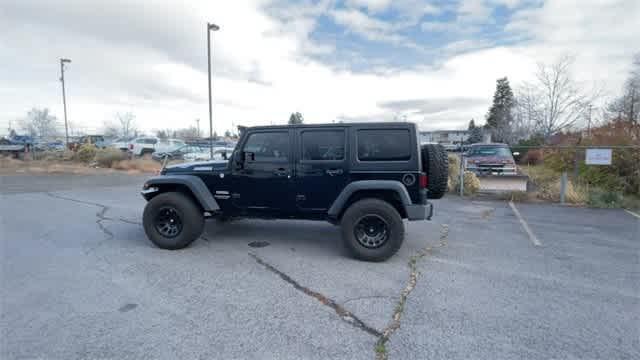 used 2014 Jeep Wrangler Unlimited car, priced at $19,990