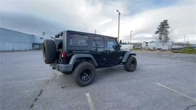 used 2014 Jeep Wrangler Unlimited car, priced at $19,990