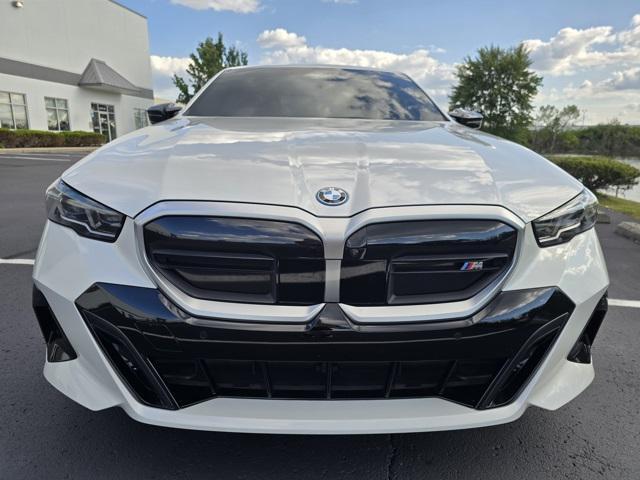 used 2024 BMW i5 car, priced at $60,000