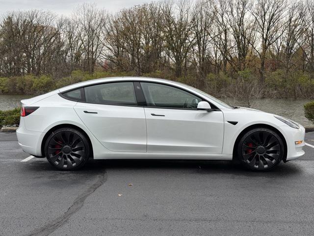 used 2021 Tesla Model 3 car, priced at $30,000