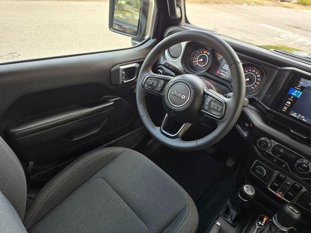 used 2024 Jeep Wrangler car, priced at $33,998