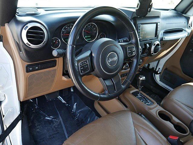 used 2015 Jeep Wrangler Unlimited car, priced at $27,488