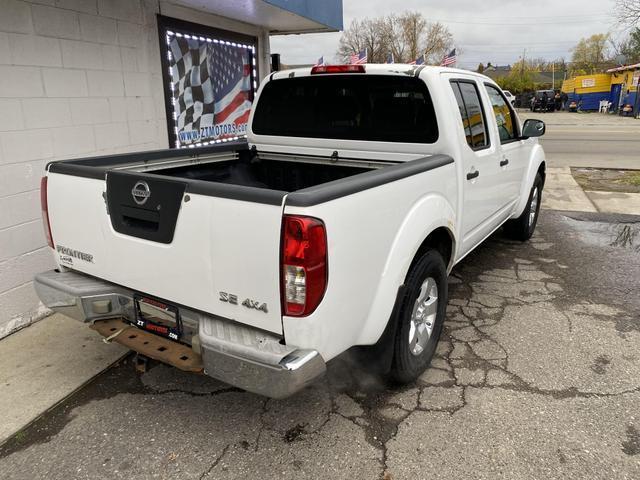 used 2009 Nissan Frontier car, priced at $5,000