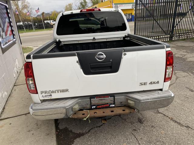 used 2009 Nissan Frontier car, priced at $5,000