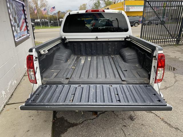 used 2009 Nissan Frontier car, priced at $5,000