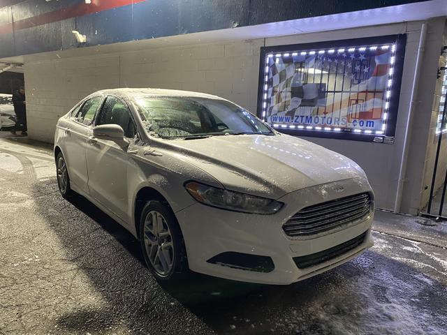 used 2014 Ford Fusion car, priced at $6,600