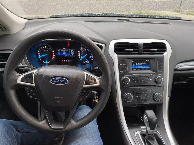 used 2015 Ford Fusion car, priced at $4,700