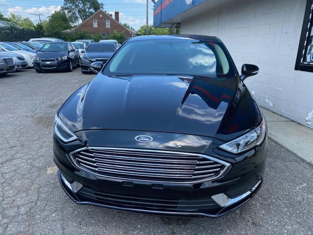 used 2018 Ford Fusion car, priced at $11,700