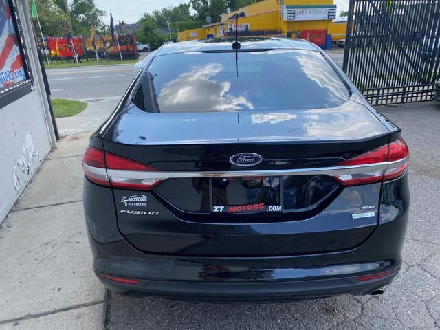 used 2018 Ford Fusion car, priced at $11,700